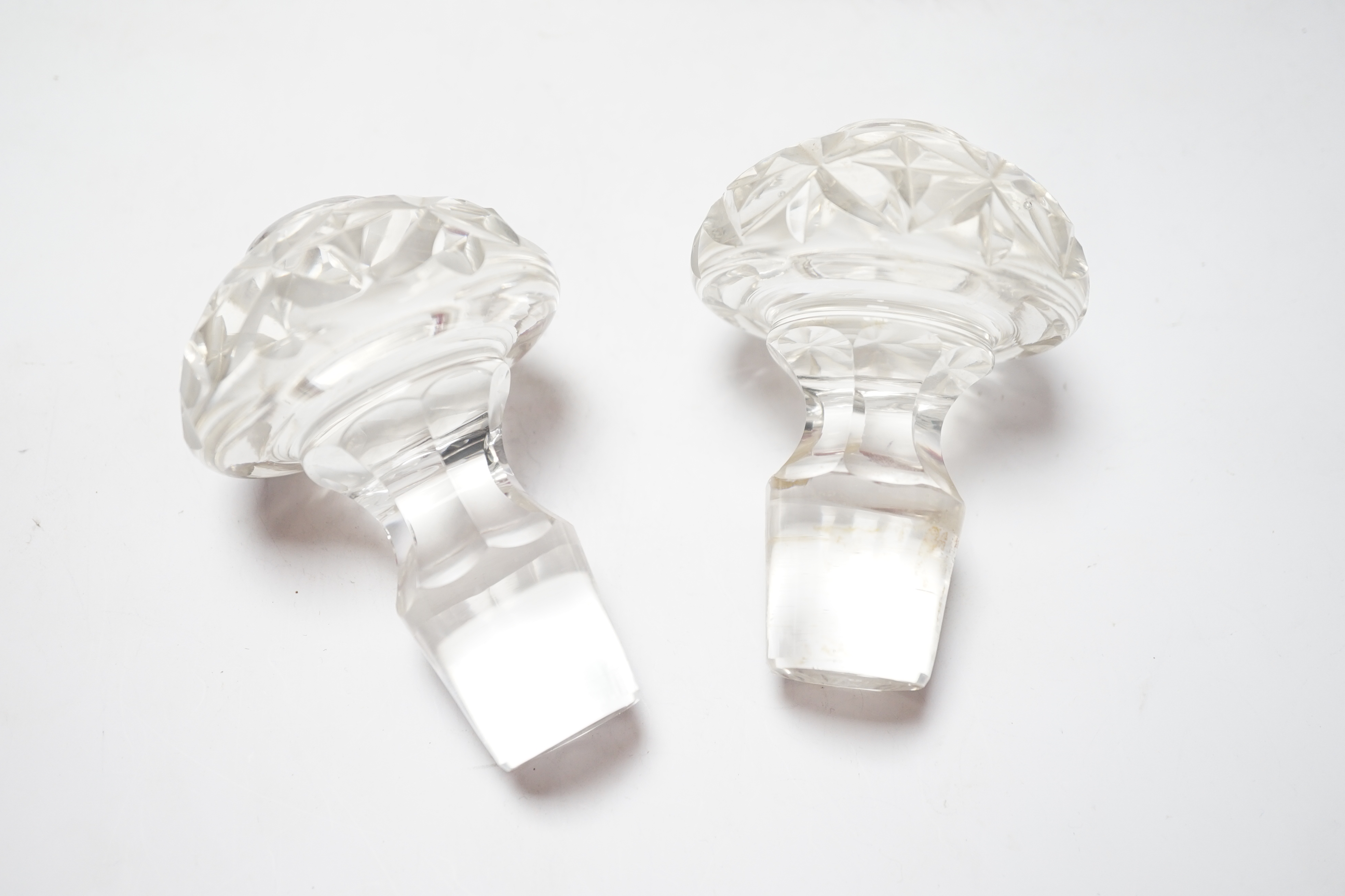A pair of large Regency style cut glass magnum decanters and stoppers, 39cm high